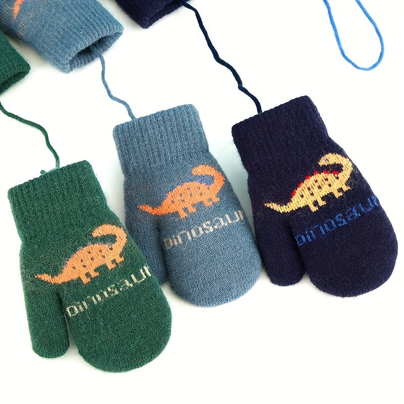 Moufles brodées à motif dinosaure reliées par un cordon en maille pour enfant
